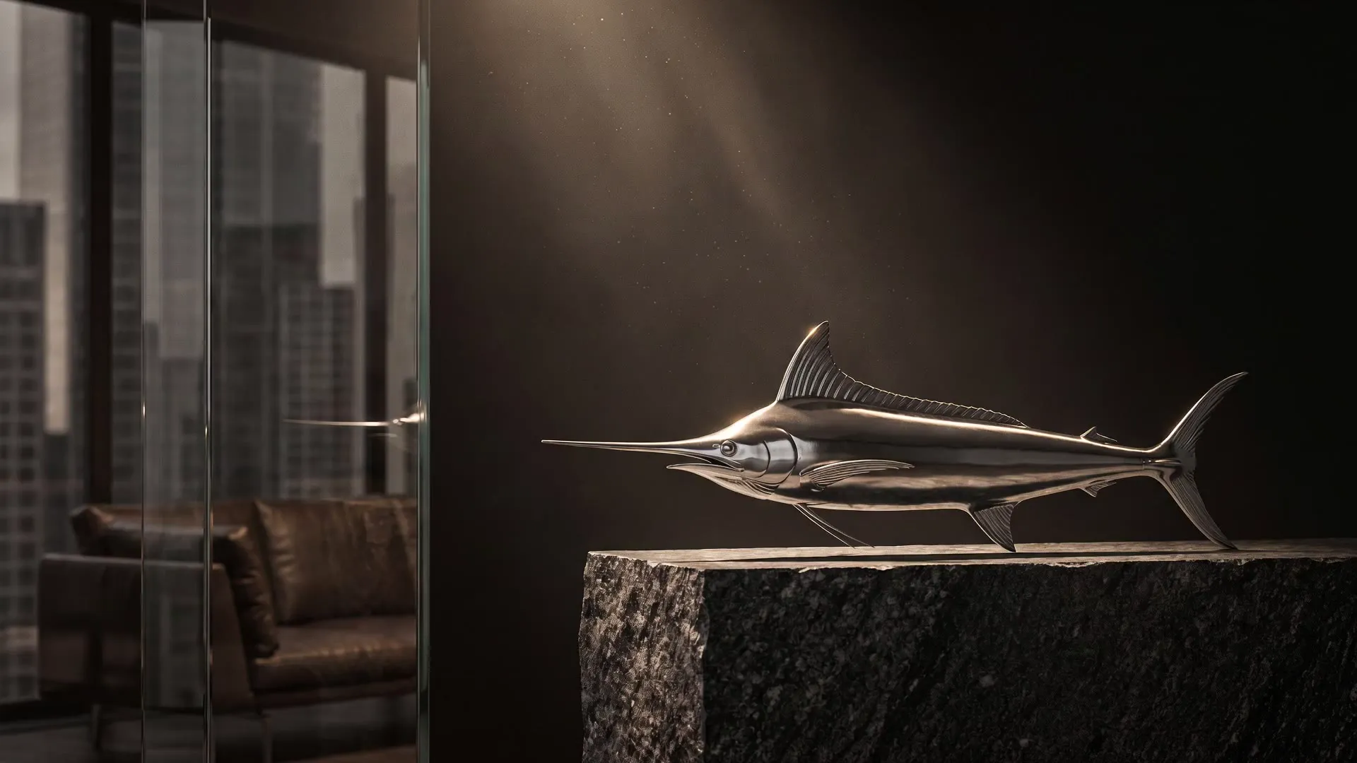 Chrome marlin sculpture on a stone plinth in champagne-gold light